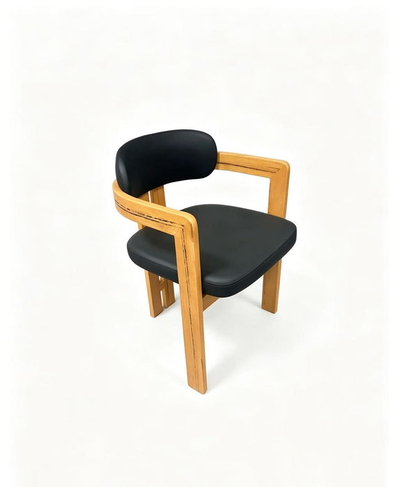 Prevelly PU Dining Chair in black PU with a timber frame, three quarter view