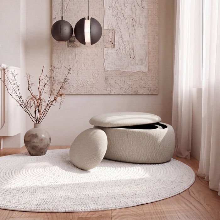 Manila Fabric Storage Ottoman in Beige with the lid lifted, showing the internal storage