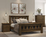 Wooden bedroom furniture set including bed, dresser, and nightstands in a room setting.