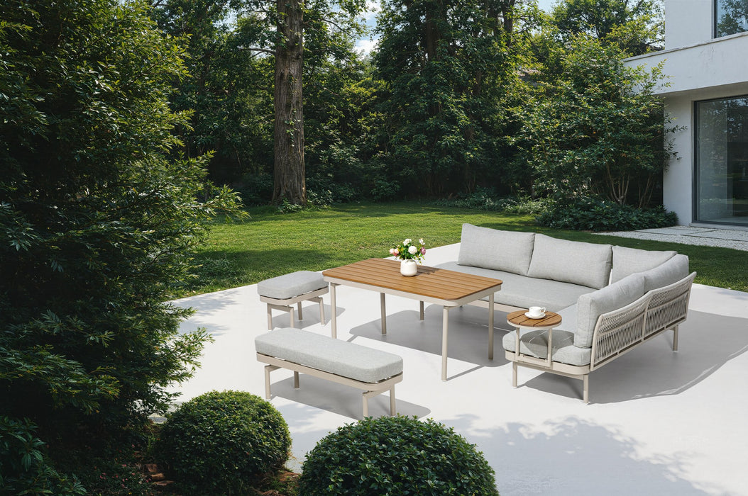 Lumi 6 Piece Outdoor Lounge Set in a garden courtyard