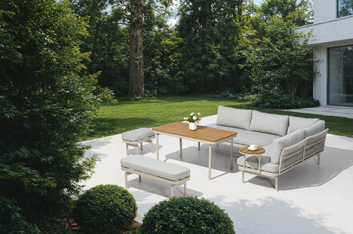 Lumi 6 Piece Outdoor Lounge Set in a garden courtyard