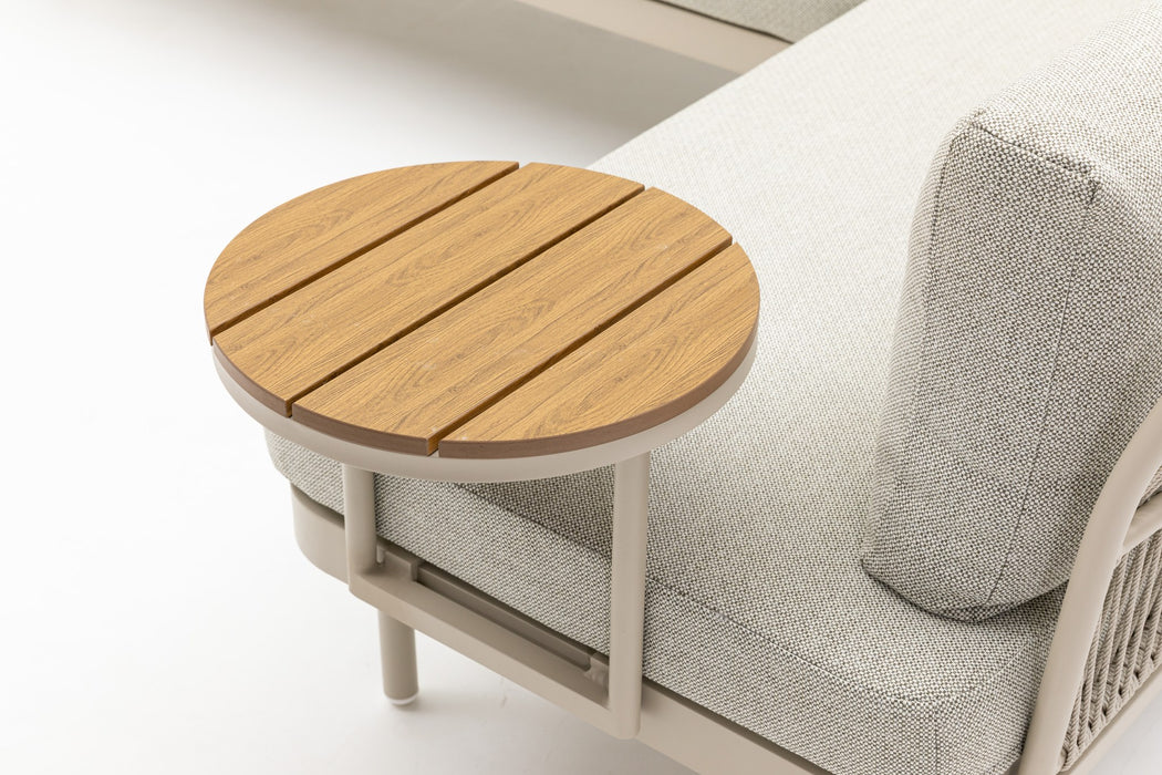 Close up of the Lumi round side table beside the sofa