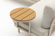 Close up of the Lumi round side table beside the sofa