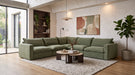 Vegas 5 Seater Fabric Corner Modular & Ottoman in Loden, in a living room